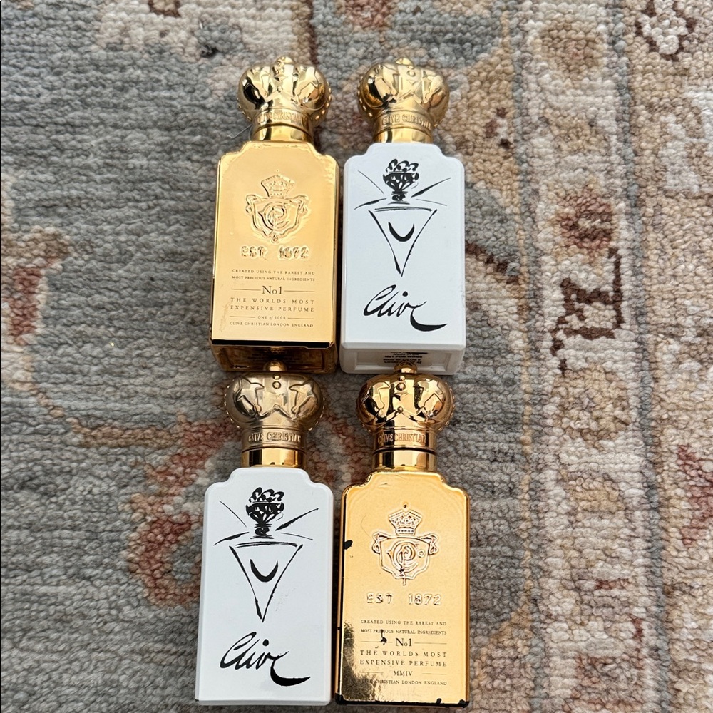 4 empty clive christian perfume bottles